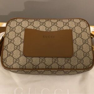 GG Supreme Monogram Emblem Mini Crossbody.